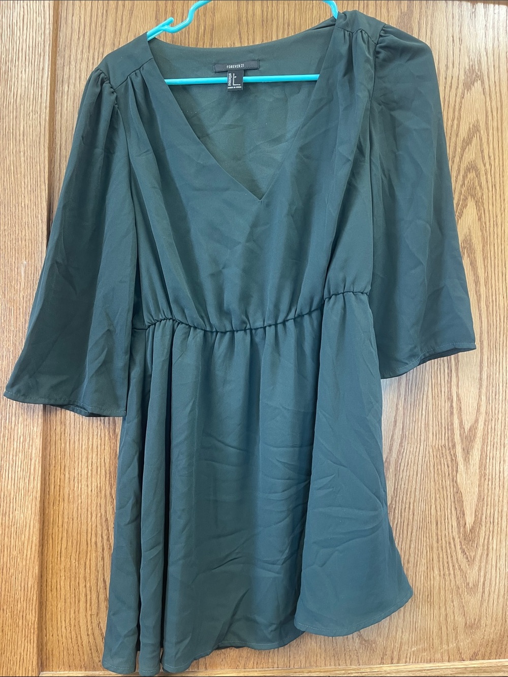 Forever 21 Dark Green V-Neck Peplum Tunic